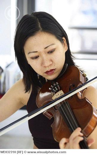 women playing violin, modern